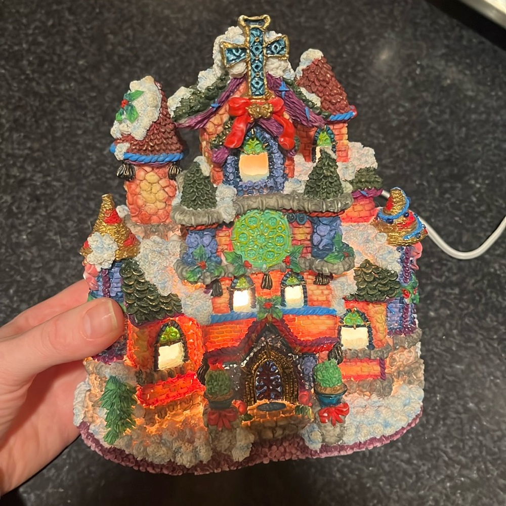 Vintage illuminated Christmas cottage